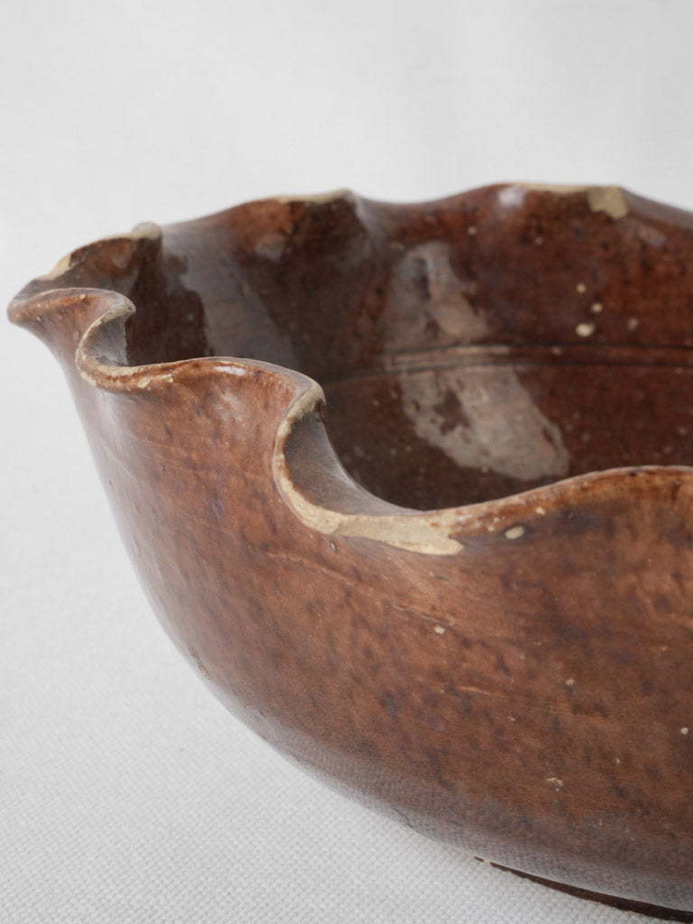 Aged, hand-crafted, wine color bowl