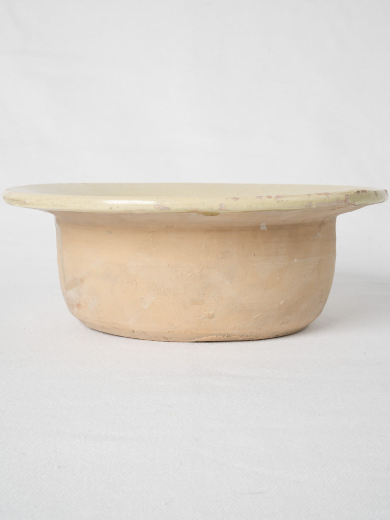 Aged yellow terracotta pot