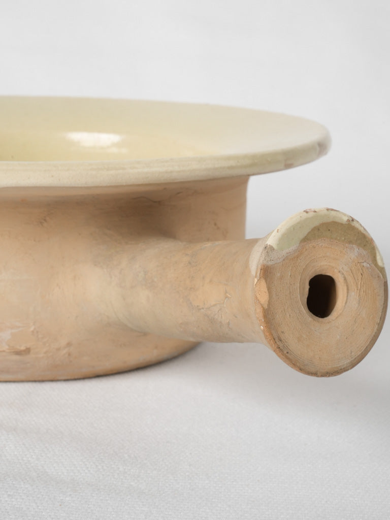 Historical yellow-glazed clay pot