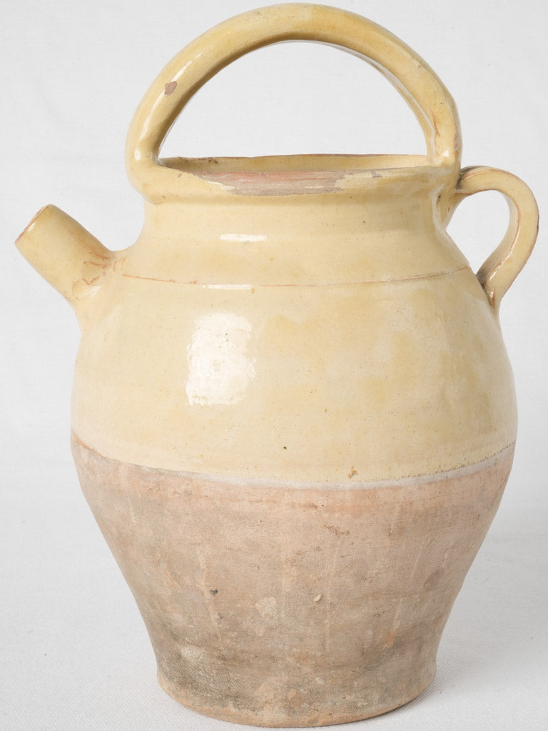 Rustic two-handled pottery vessel