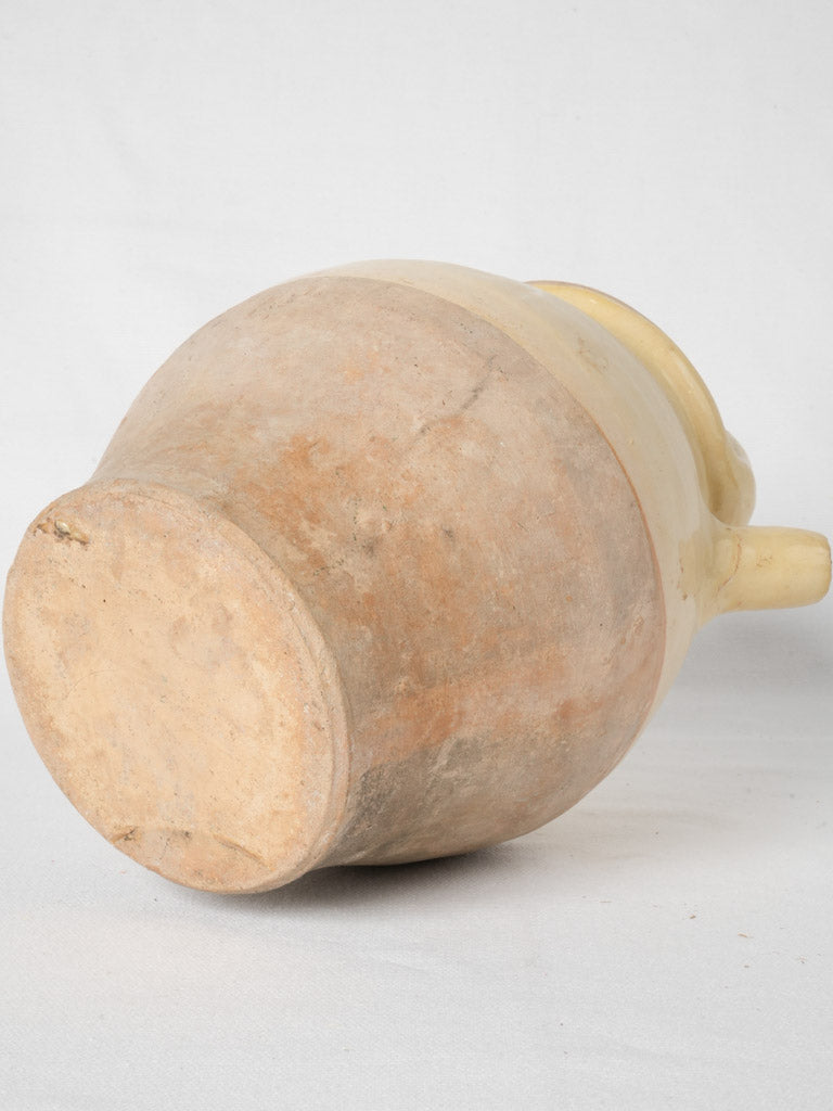 Weathered terracotta water jug