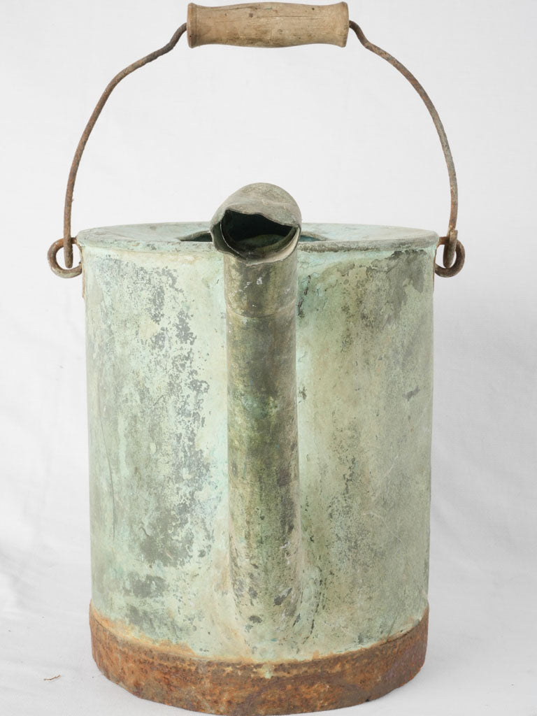 Rustic charm iron-handled irrigation pot