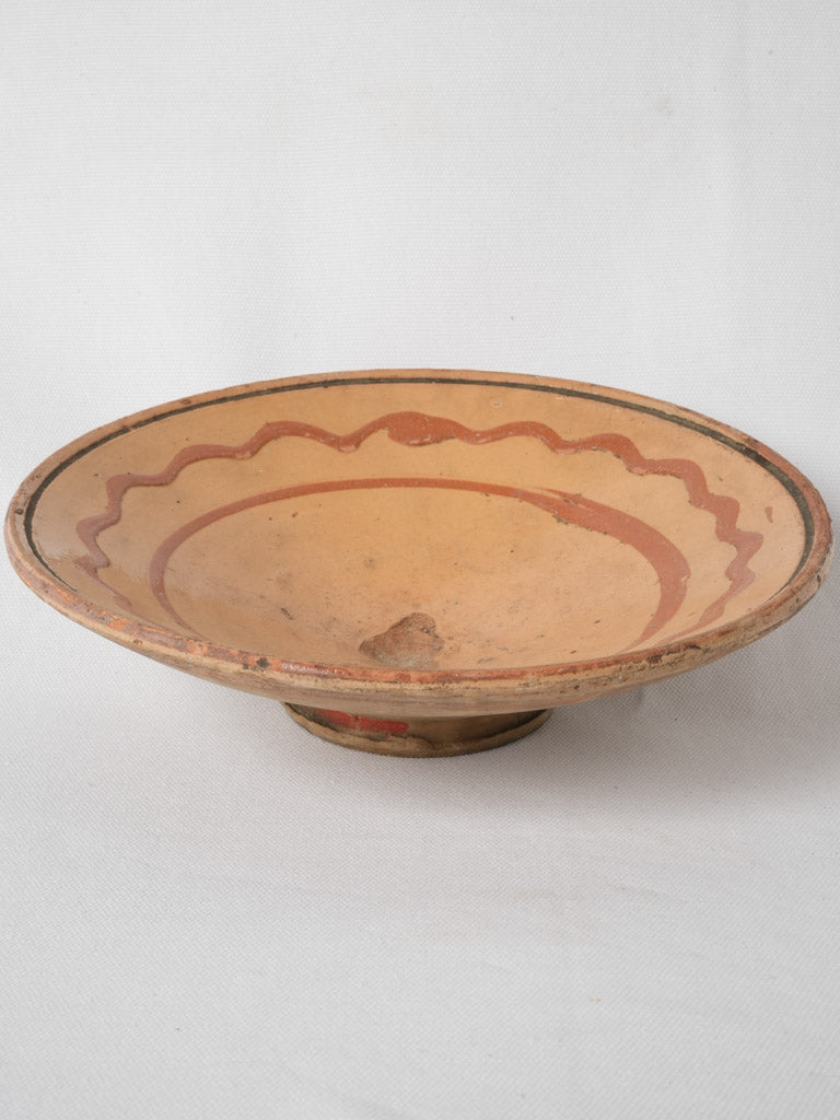 Delightful mustard-colored squiggle terracotta plate