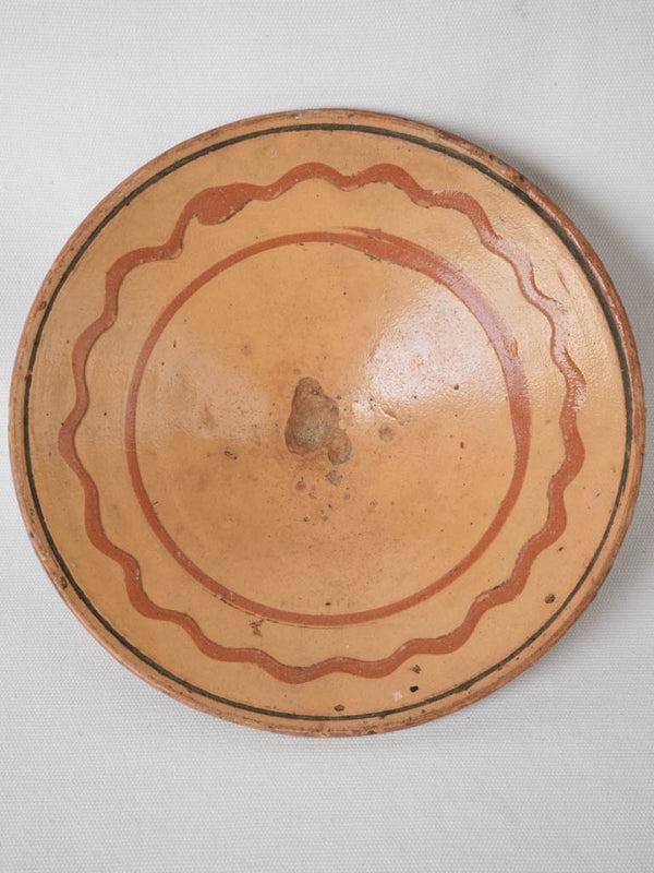 Antique French terracotta glazed omelet plate