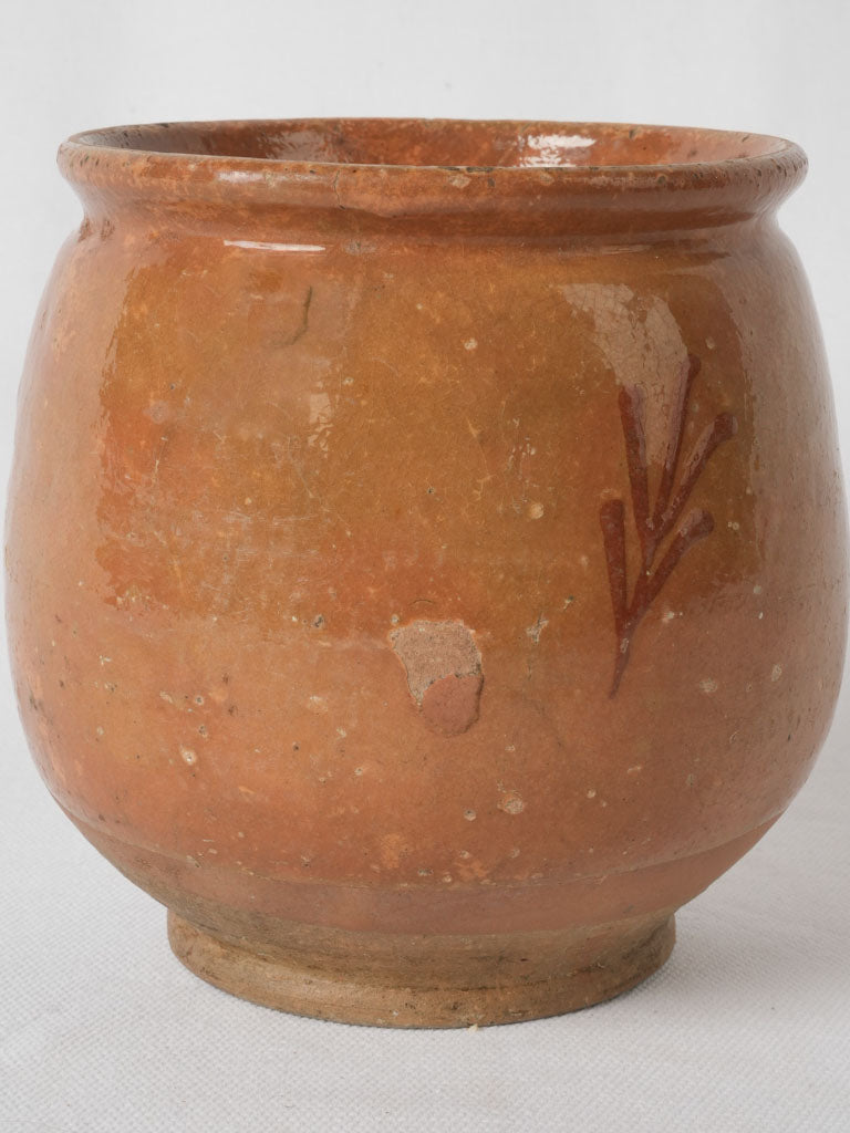 Aged ochre ceramic leaf pot
