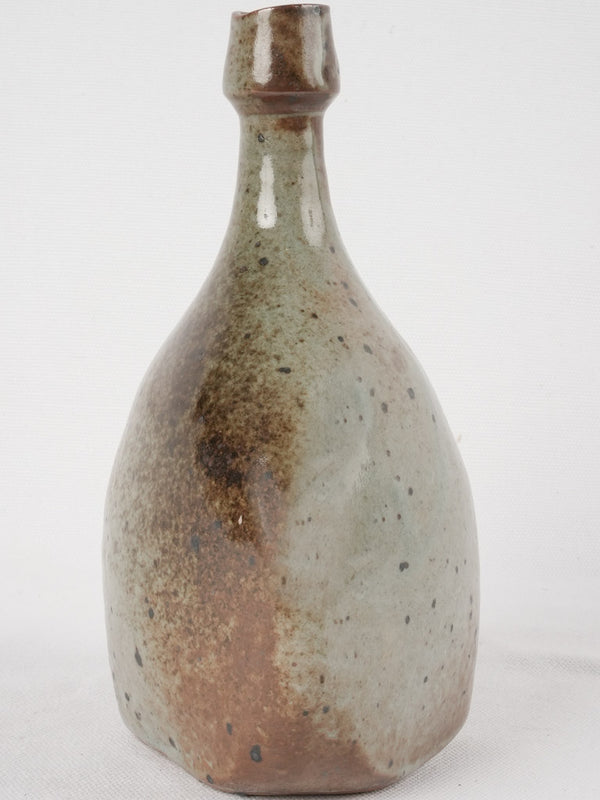 Rustic brown-black bottle-shaped vase