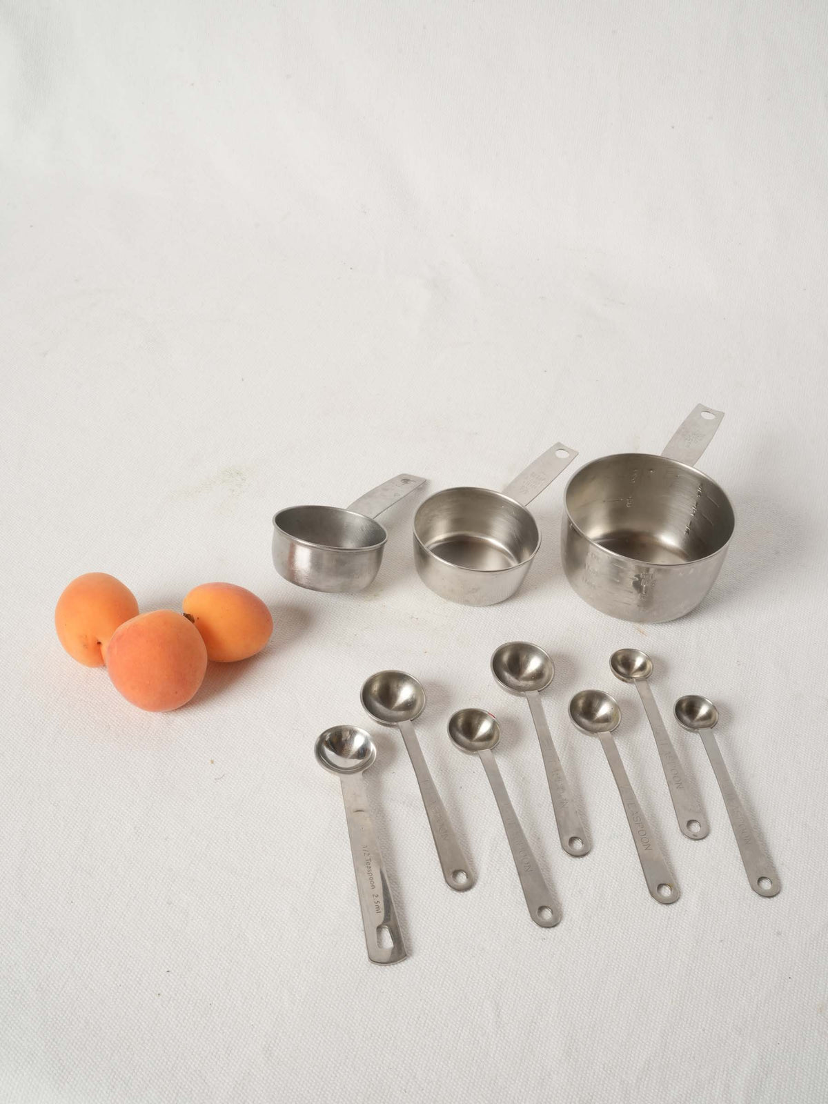 Vintage French Stainless Steel Measuring Cups with Peg Rails
