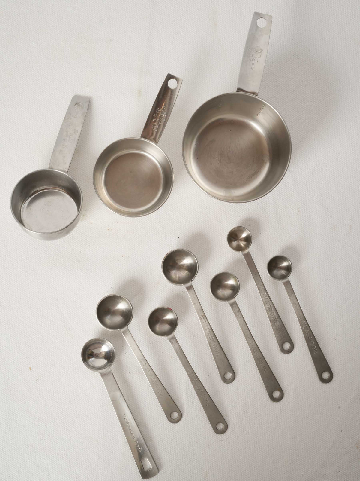 Vintage French Stainless Steel Measuring Cups with Peg Rails