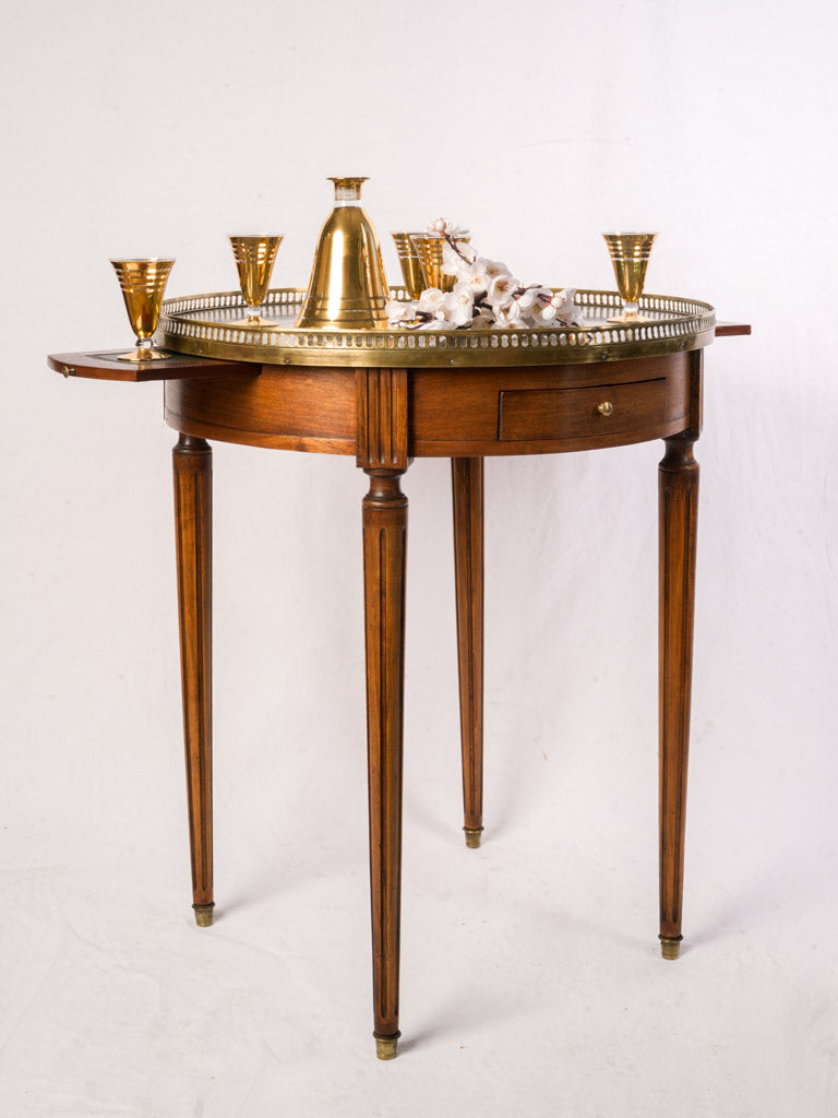 Warm patina brass gallery table