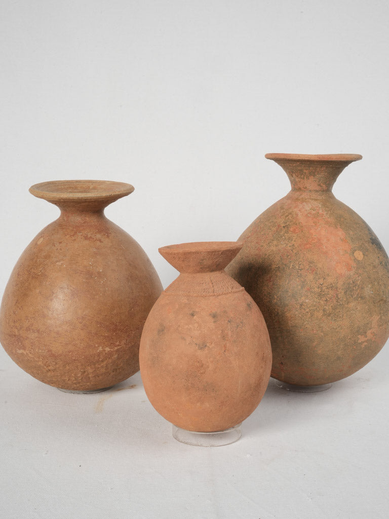 Aged terracotta burial artifacts
