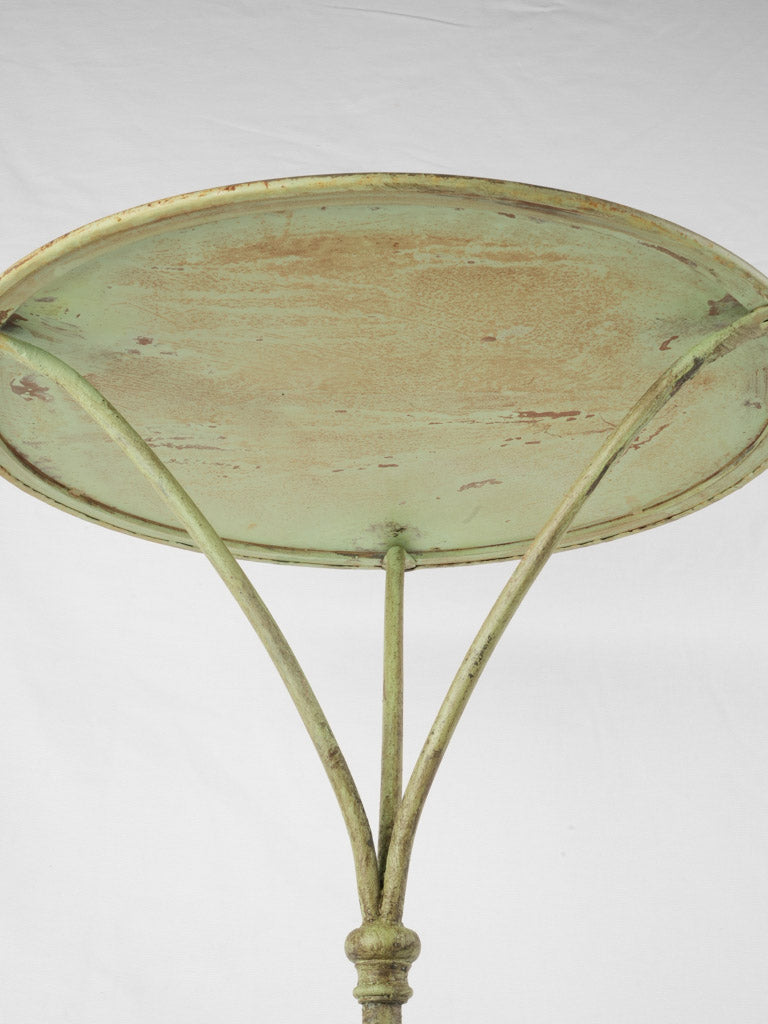Time-worn elegant green side table