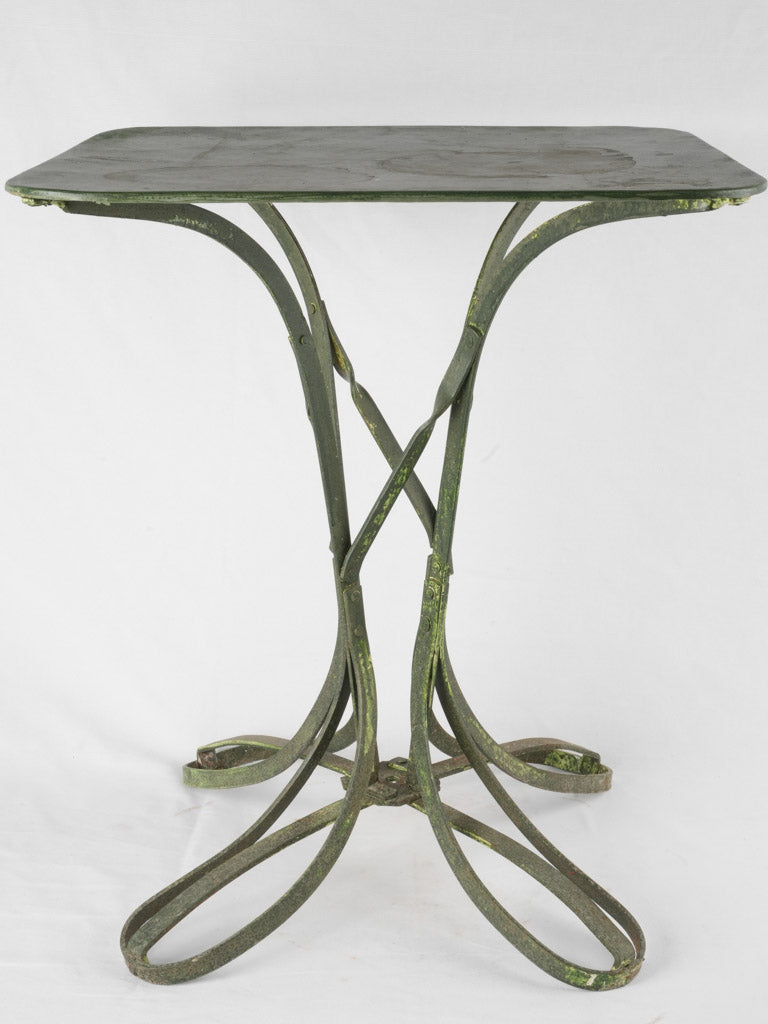 Vintage Eiffel-inspired iron bistro table