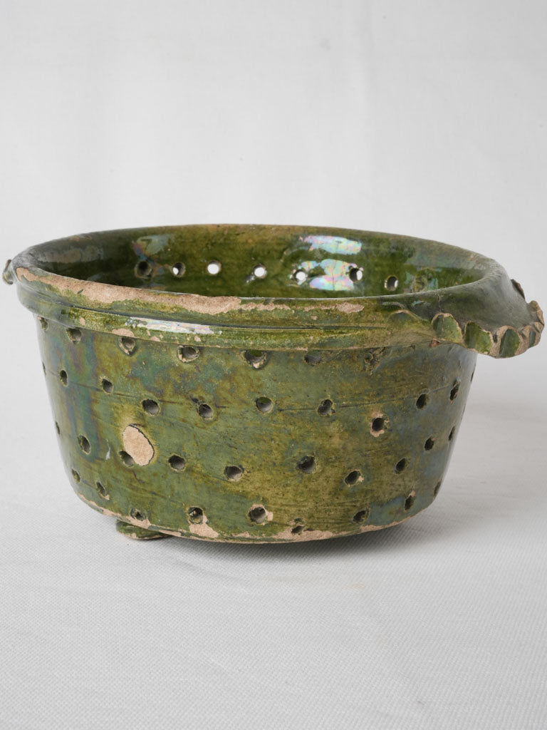 Late 19th century, green-glazed, French berry strainer