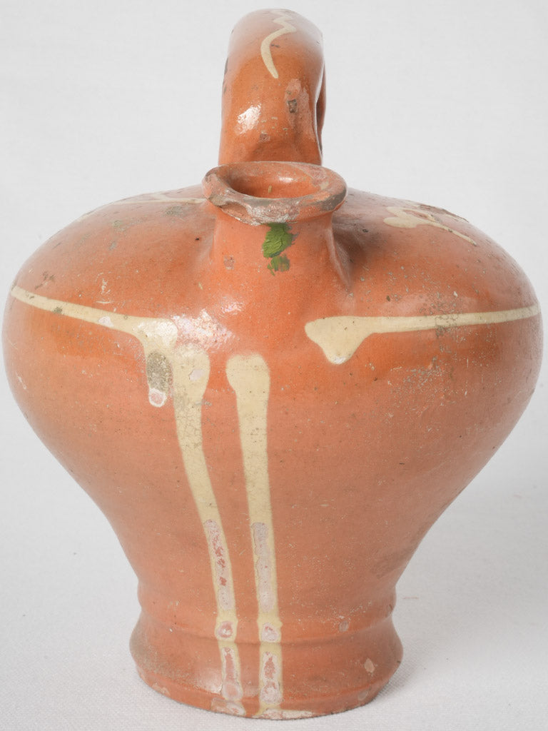 Bright ochre antique water pitcher 