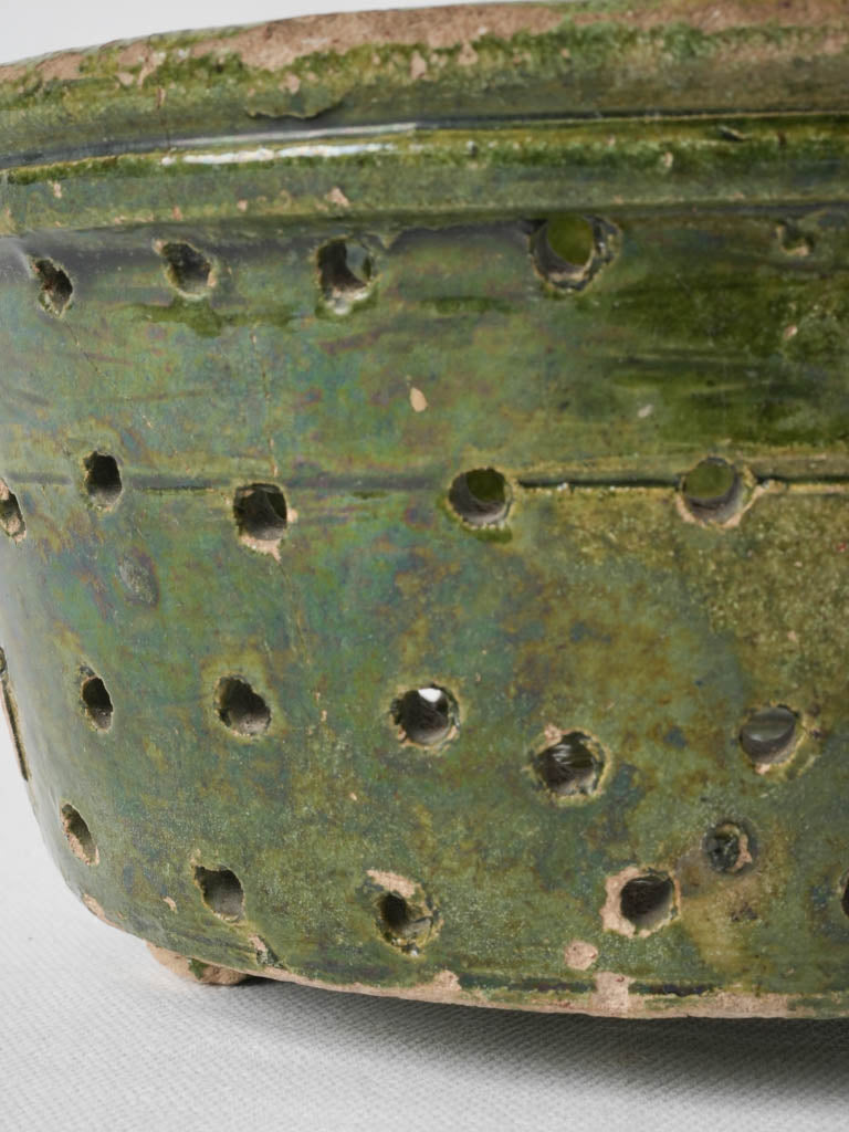 Stunning, iridescent, green-glazed terracotta bowl