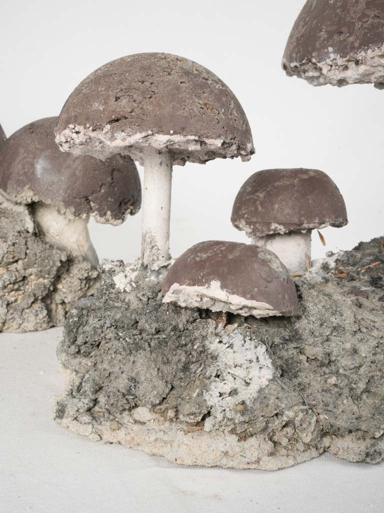 Textured aged purple mushroom statues