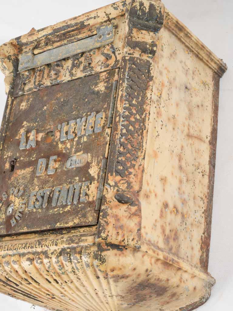 Historical iron mailbox notched wheels