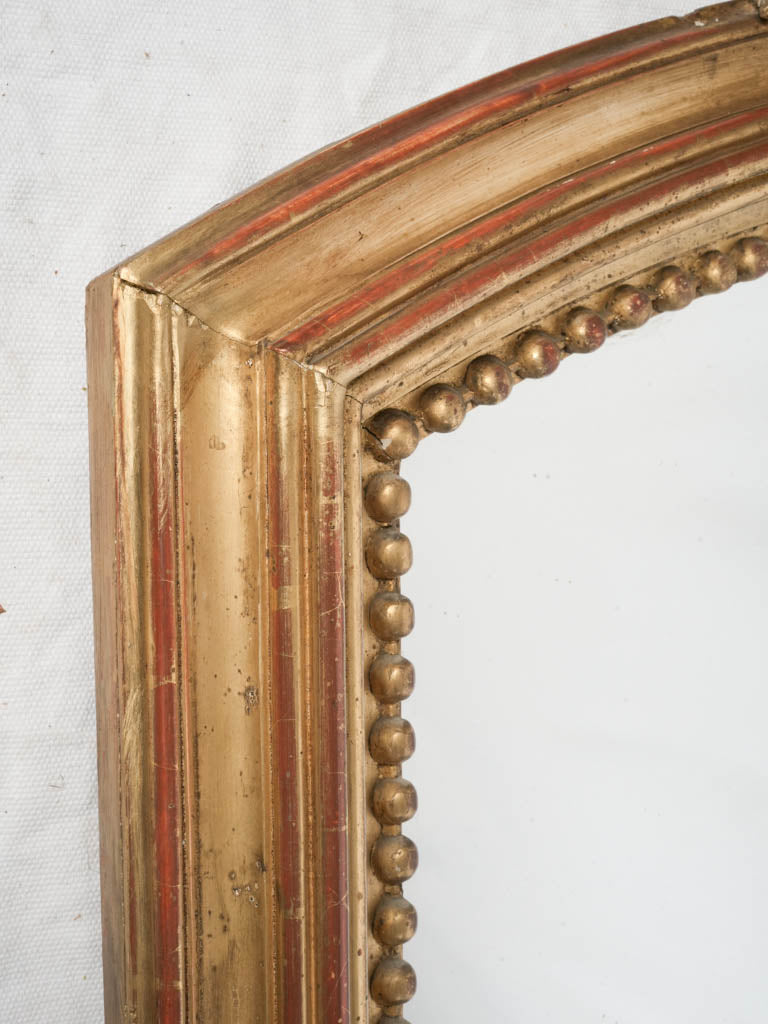 Authentic aged gilded decorative mirror