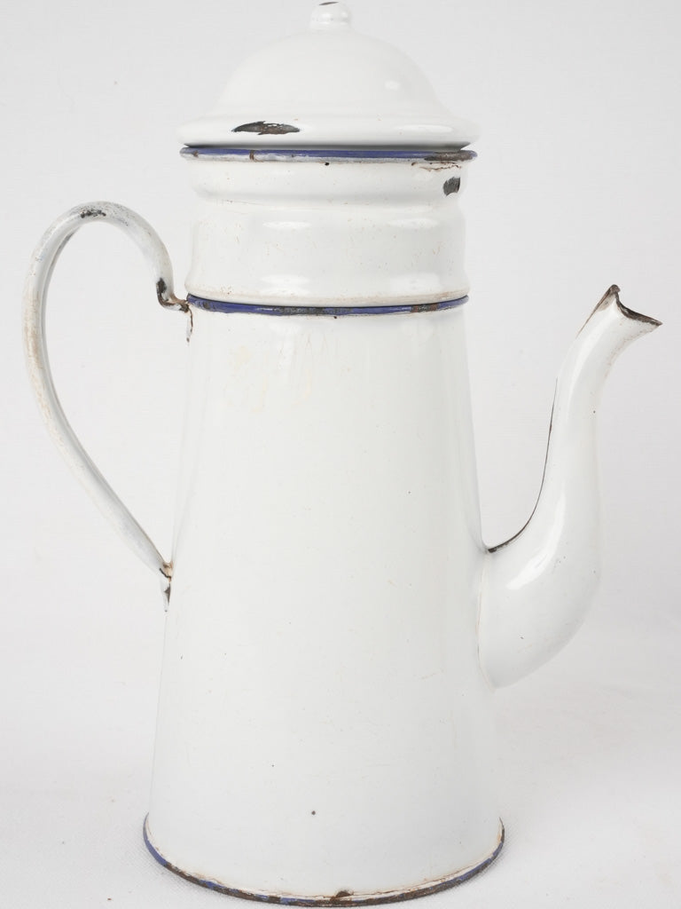 Nostalgic blue-trimmed enamel coffee pot