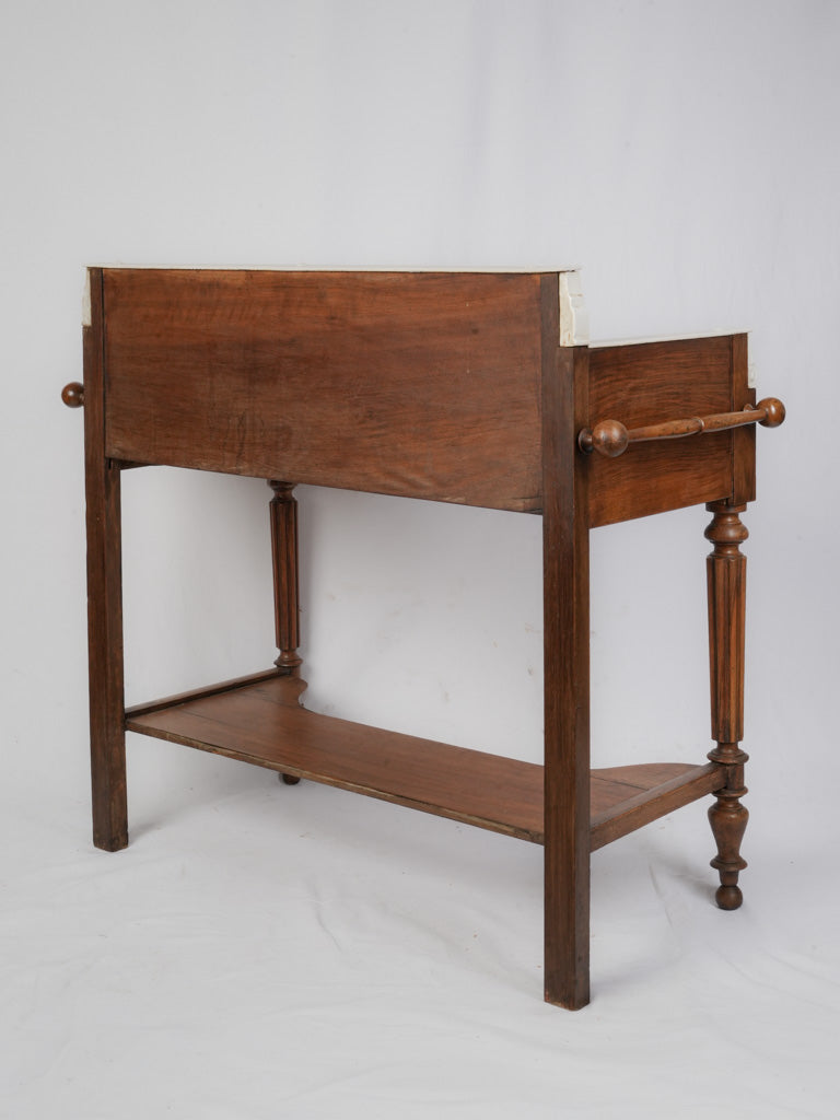 Timeworn marble-top French washstand