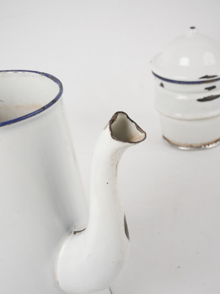 Old-fashioned white enamel coffee pot