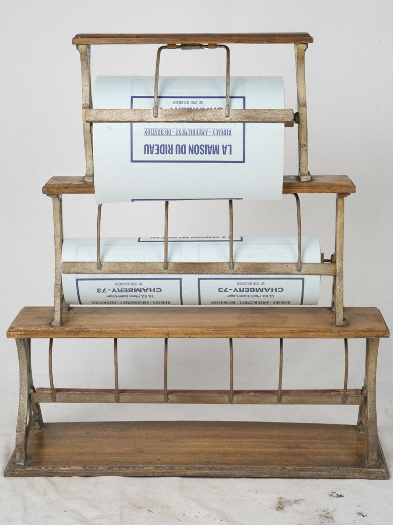 Rustic cast iron paper dispenser