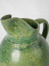 Pretty mottled green glazed curvaceous pitcher