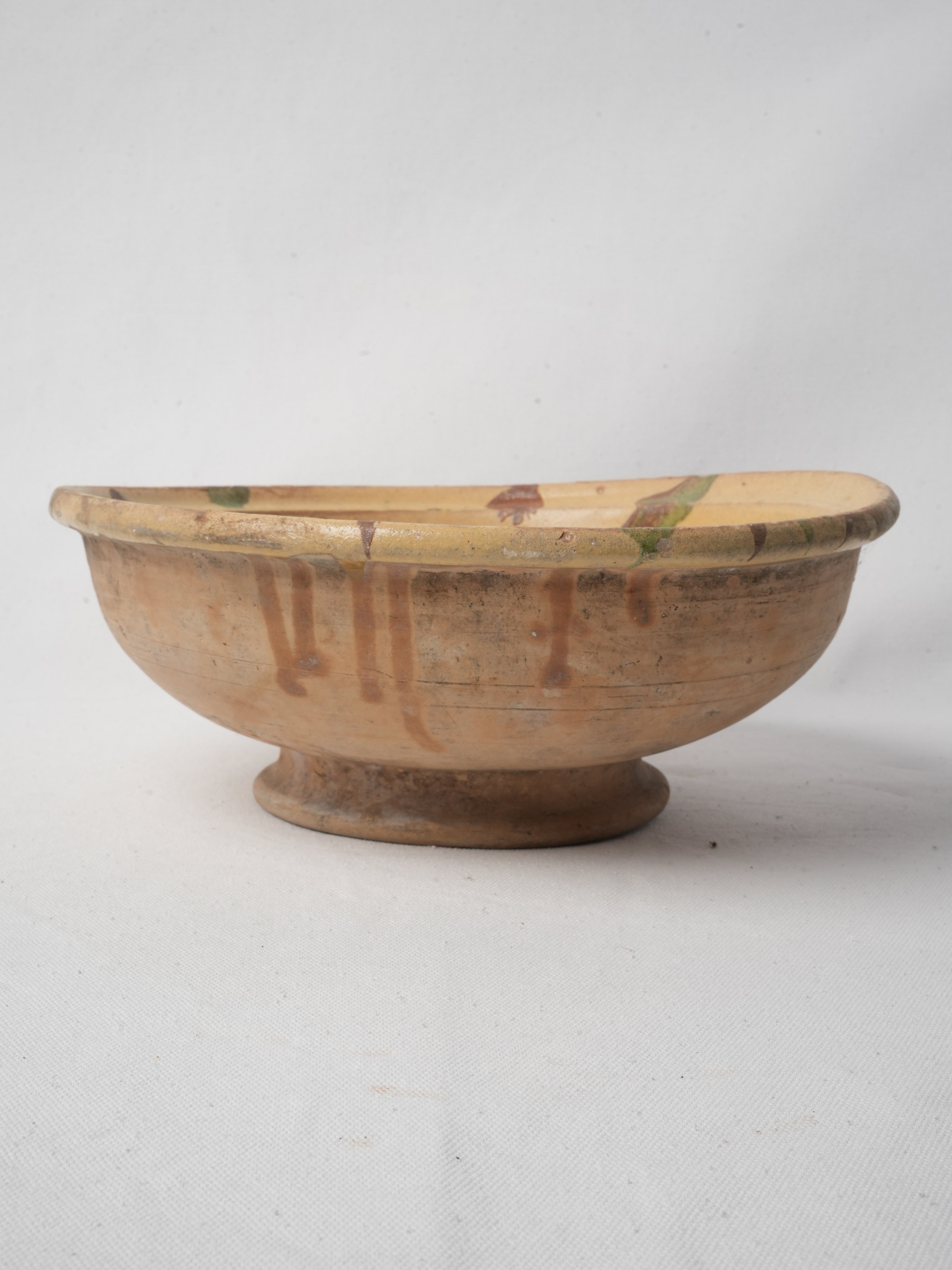 Textured unglazed earthenware item  