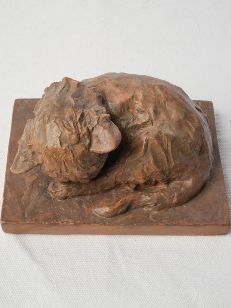 Elegant chestnut-toned feline sculpture  