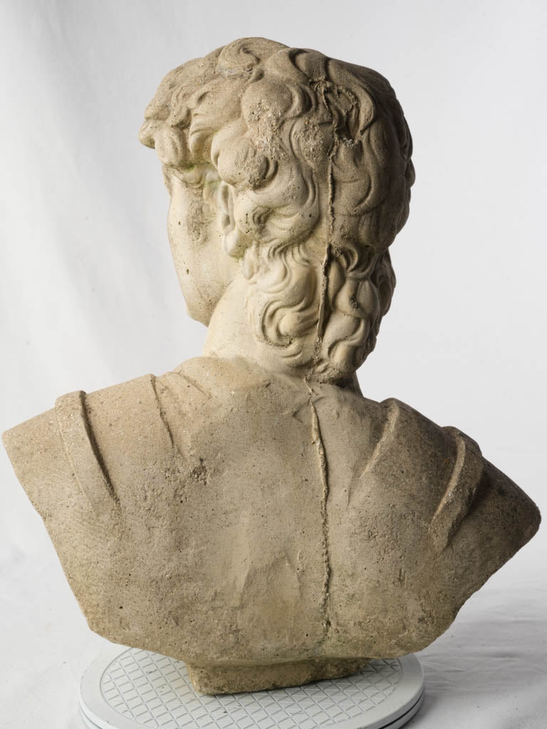 Lichen-accreted French stone sculpture  