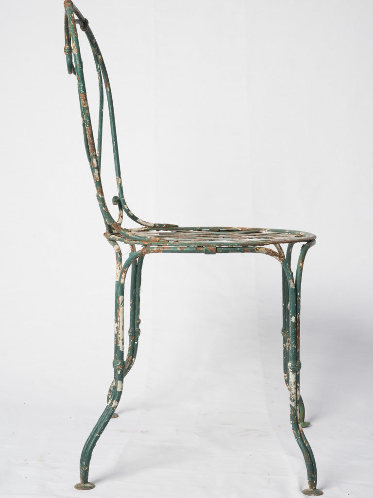 Classic escargot scrollwork outdoor chair