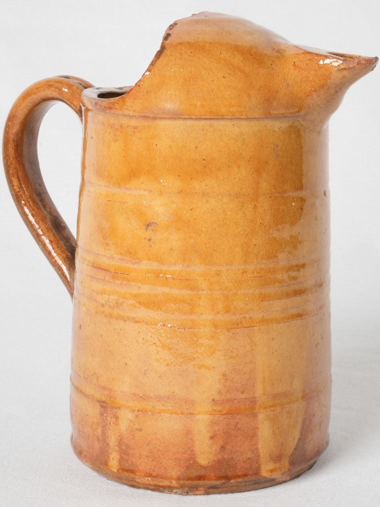 Antique French terracotta yellow pitcher