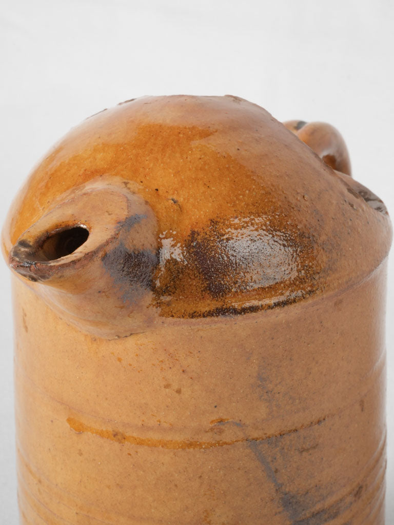 Distinctive scalloped antique terracotta jug