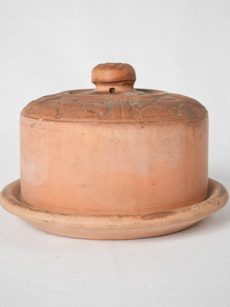 Timeless traditional terracotta butter server