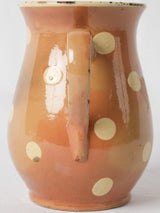 Quaint custard yellow glazed pitcher