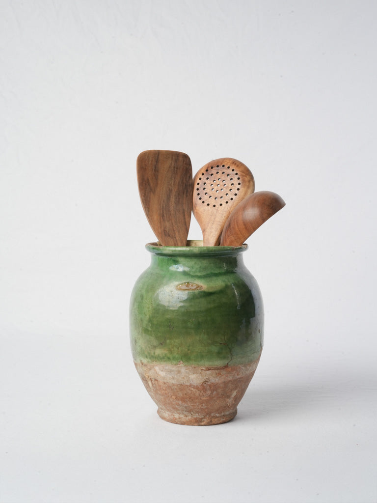 Vintage green-glazed pottery vessel