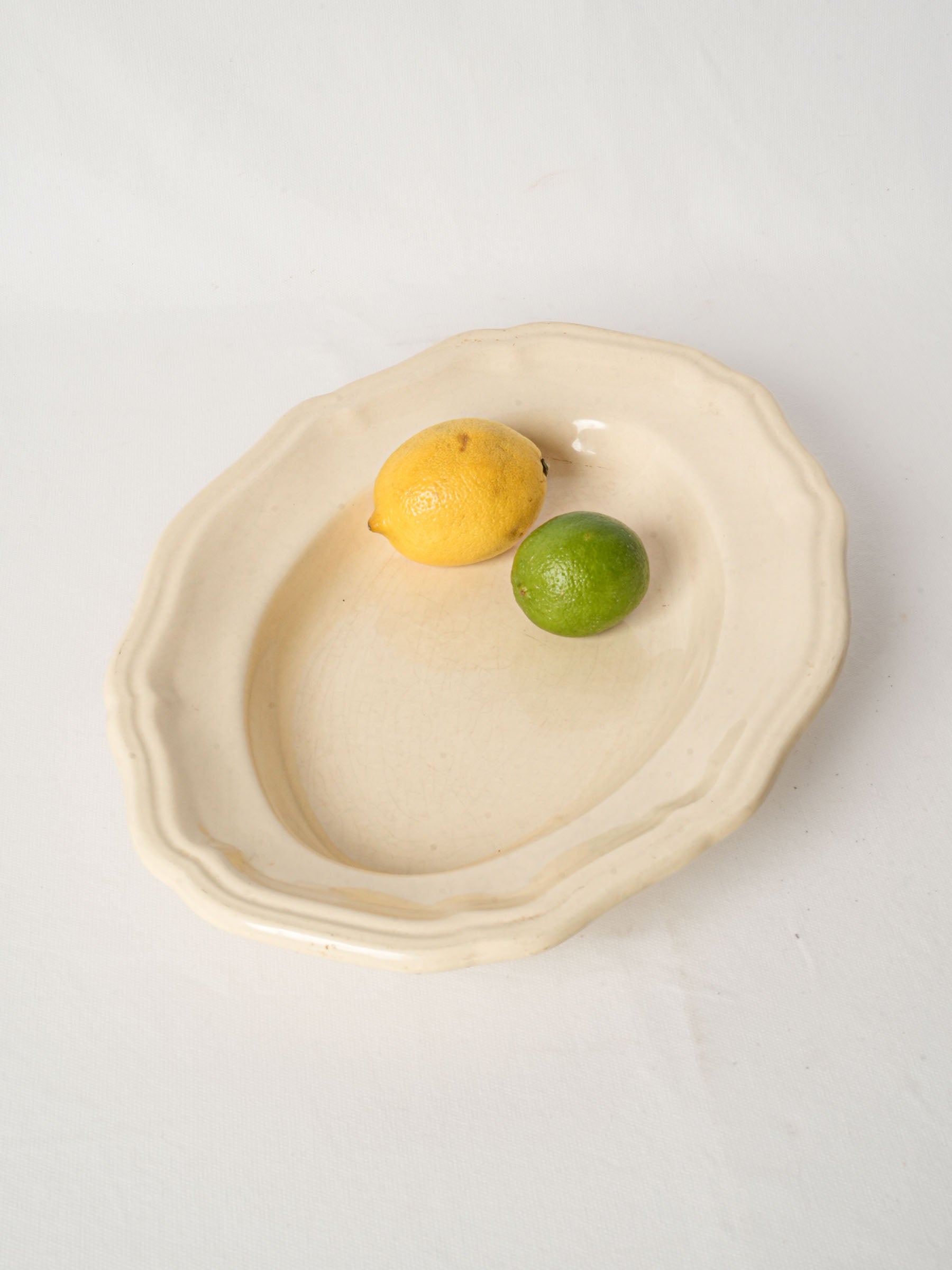 Antique french ivory-glazed ceramic serving dish