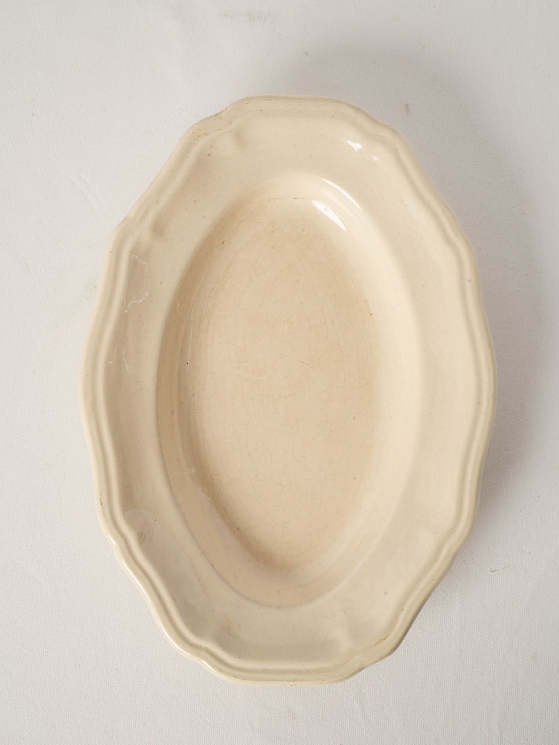 Antique french ivory-glazed ceramic serving dish