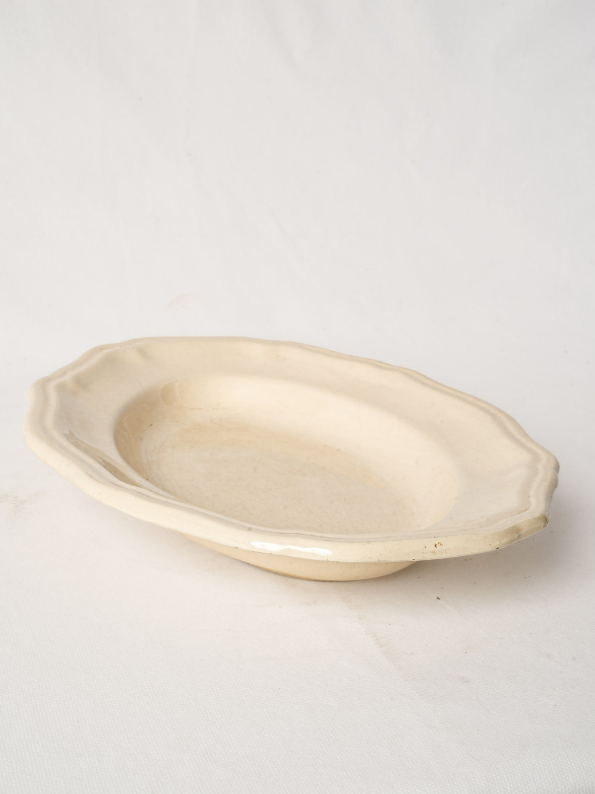 Antique french ivory-glazed ceramic serving dish