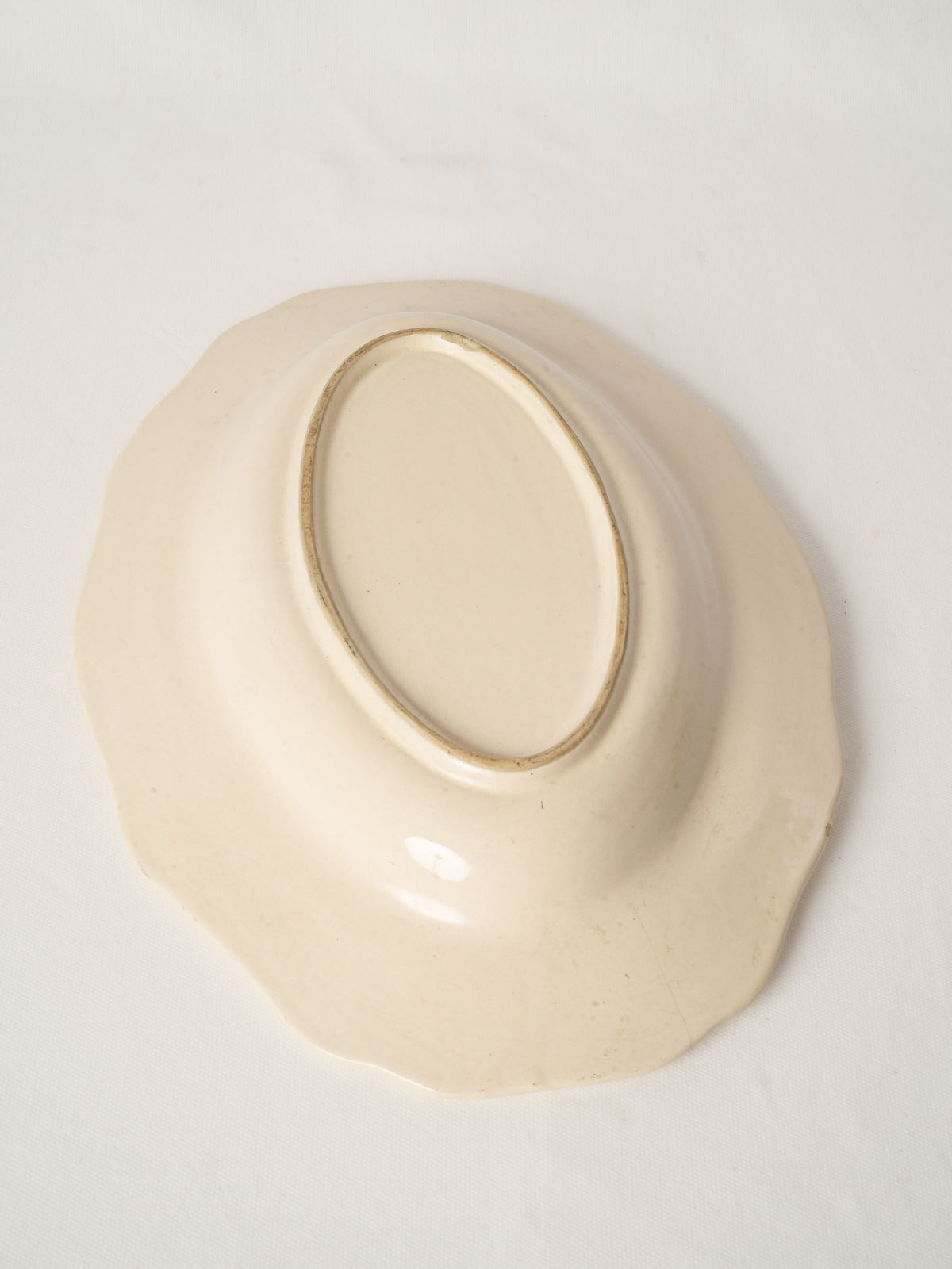 Antique french ivory-glazed ceramic serving dish