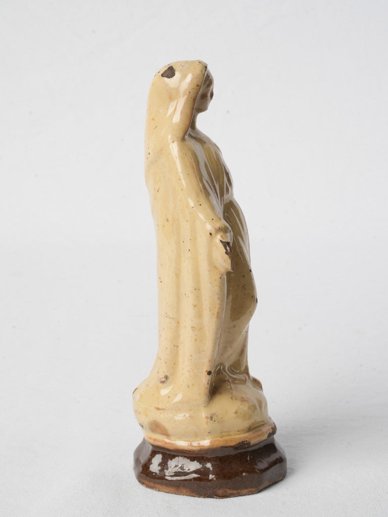 Handcrafted speckled terracotta statuette  