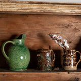 Antique alpine region glazed ceramic pitcher