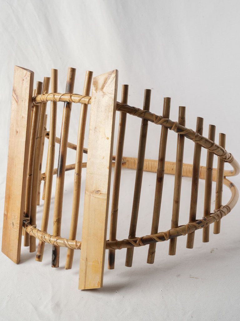 Artful curving fireplace log holder