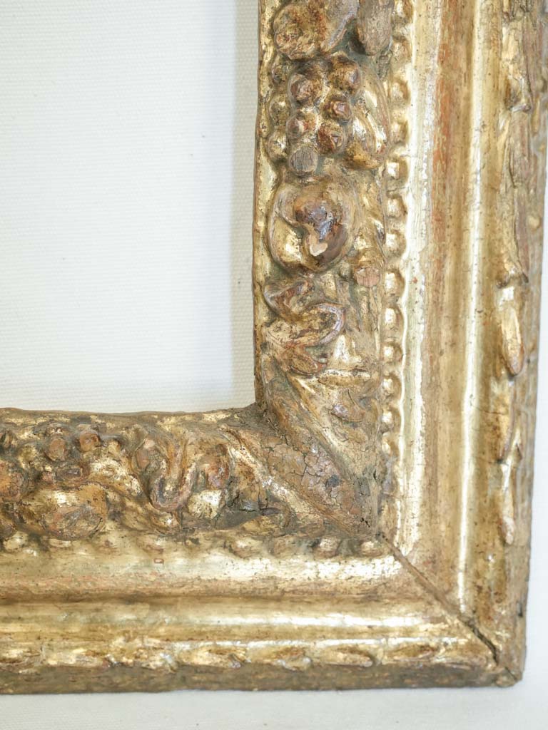 Patina-finished ornamental display frame  