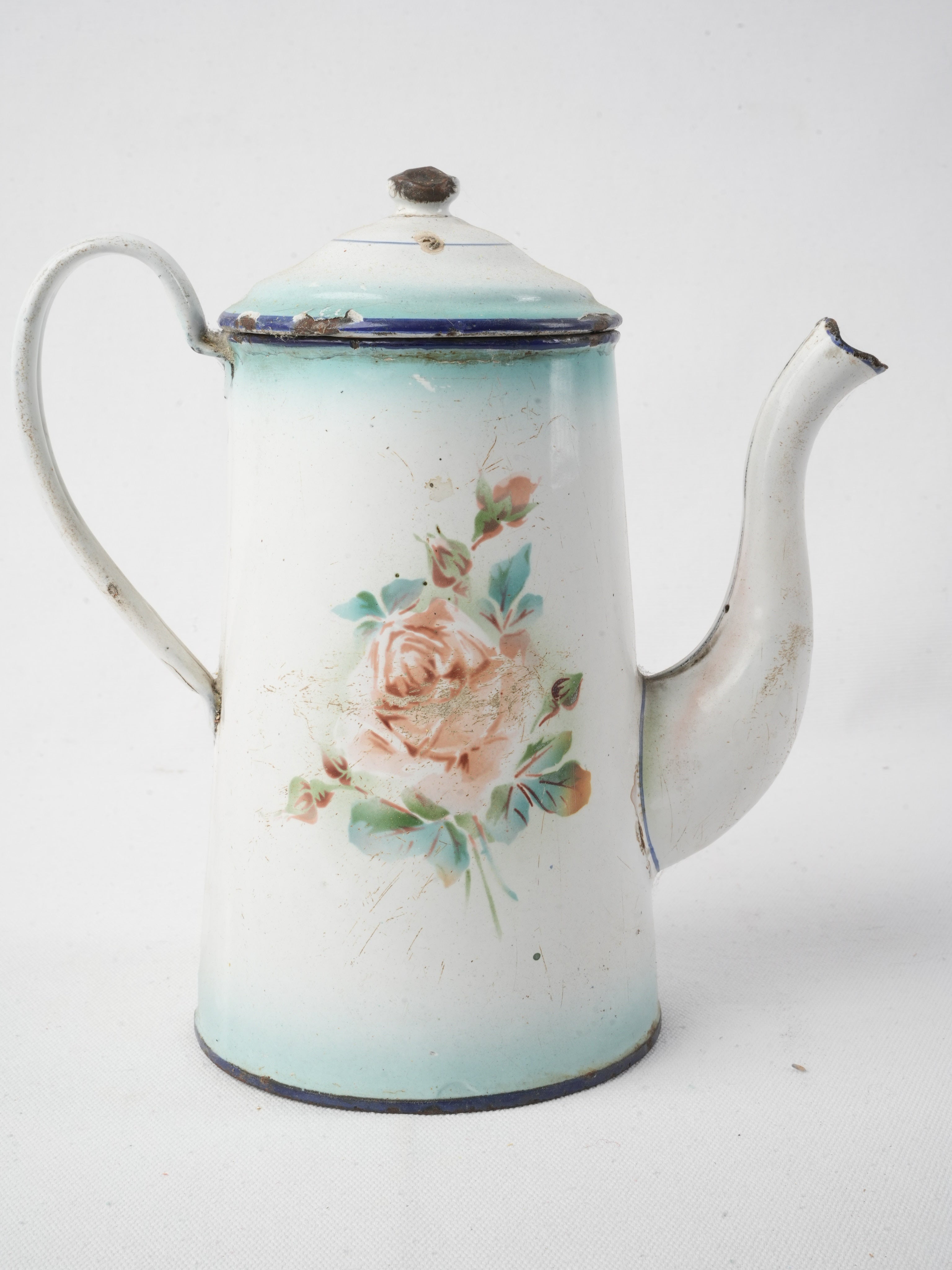 Charming faded enamel coffee pot  