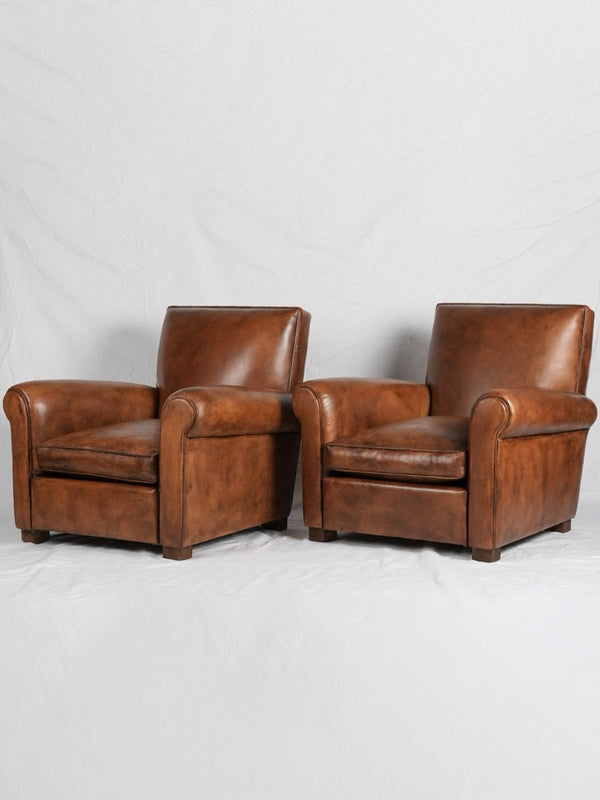 PAIR of bespoke leather club chairs - Taittinger design