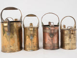 Collection of 4 copper watering cans