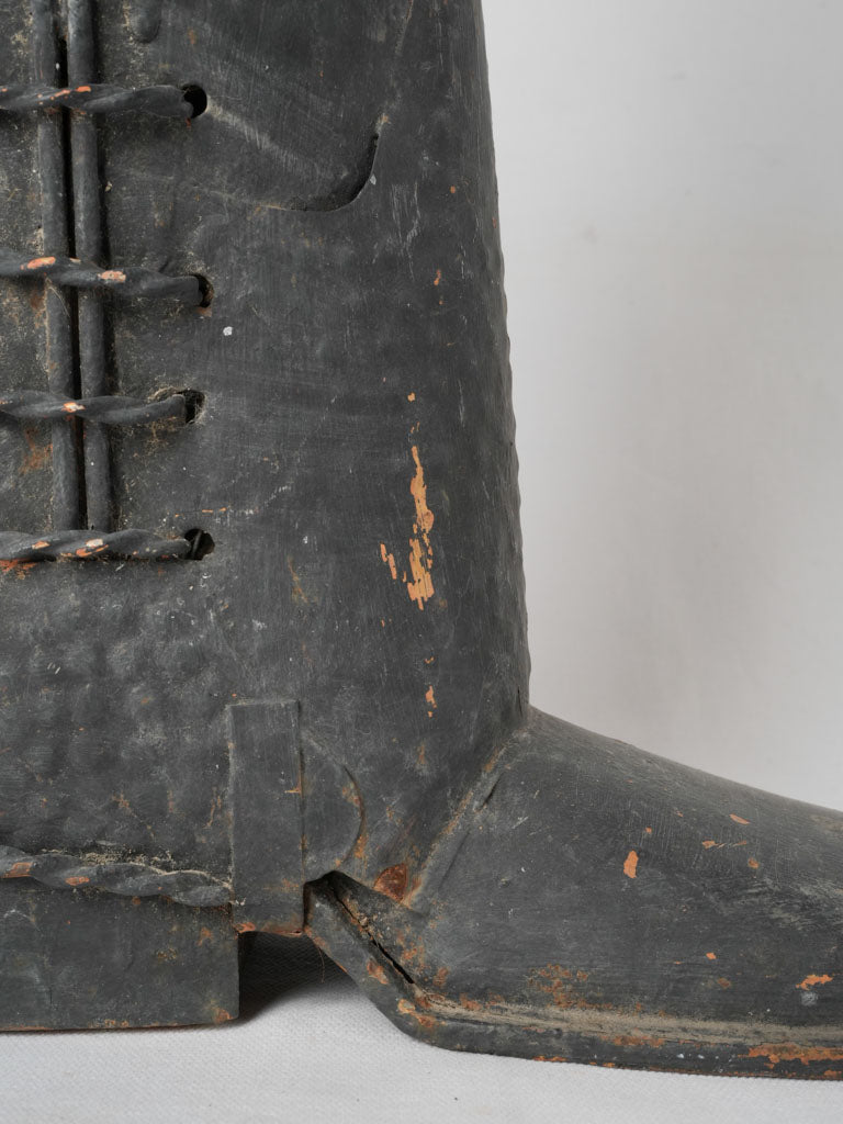Timeless black-painted iron boot holder