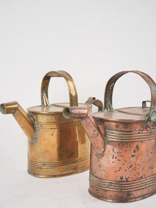 Collection of 4 copper watering cans