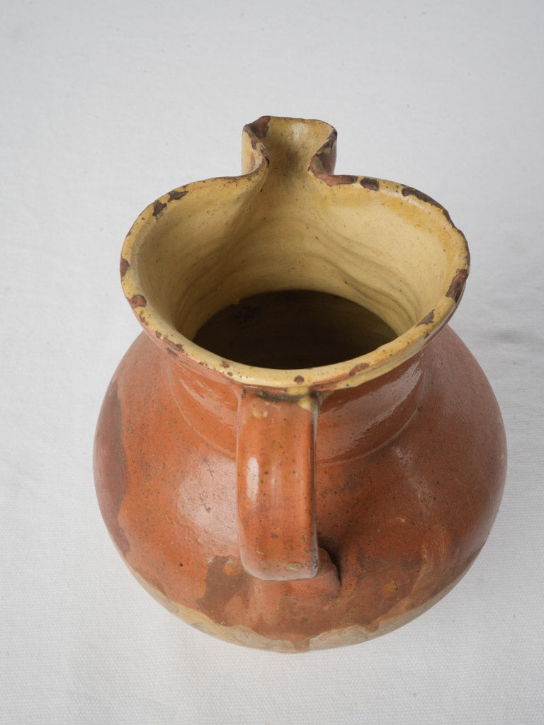 Elegant glazed terracotta jug   